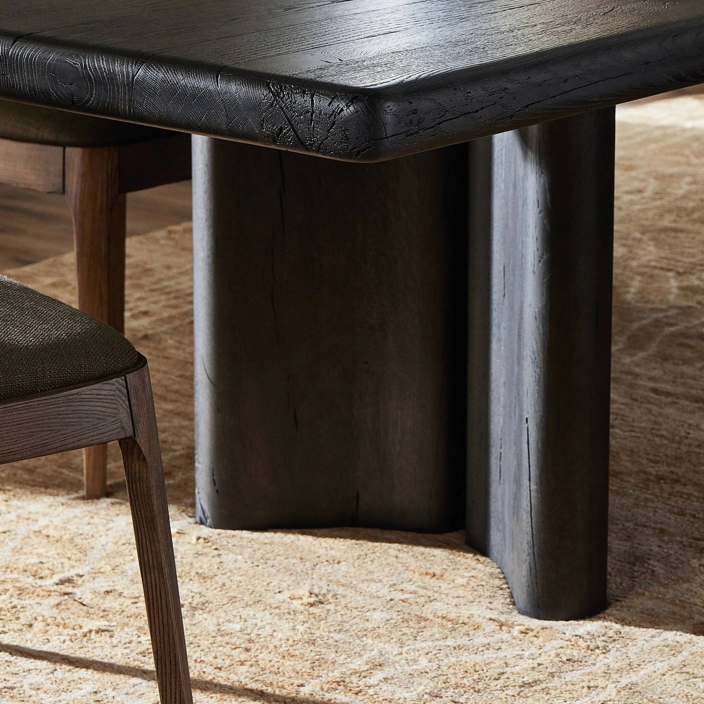 009 SI-2137277 | Closeup | Castro Dining Table by Four Hands in dark espresso. Made from solid reclaimed oak in a modern style.