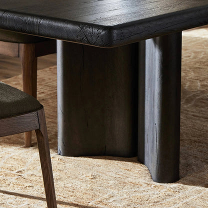 Castro Dining Table by Four Hands in dark espresso. Made from solid reclaimed oak in a modern style.