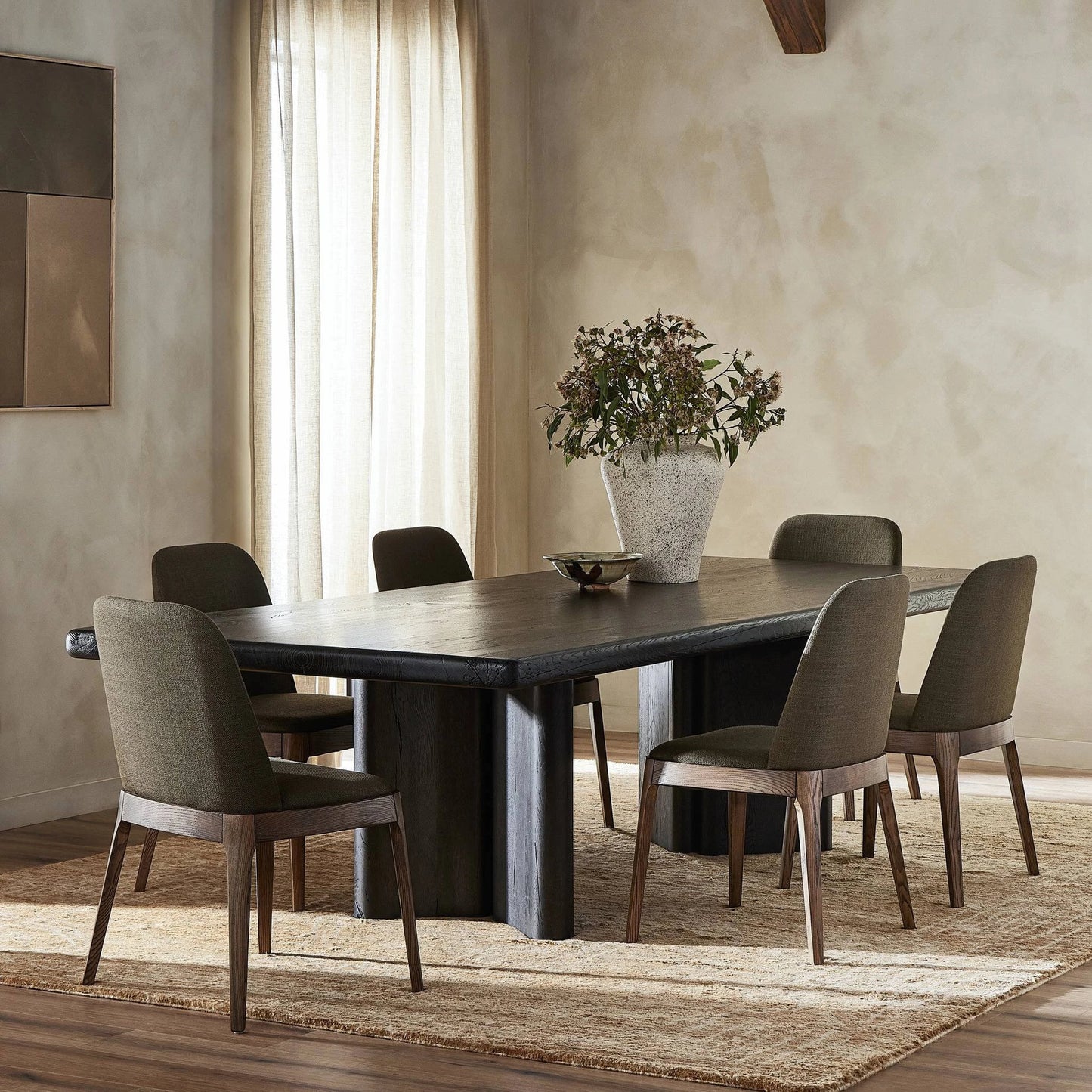010 SI-2137277 | Lifestyle | Castro Dining Table by Four Hands in dark espresso. Made from solid reclaimed oak in a modern style.