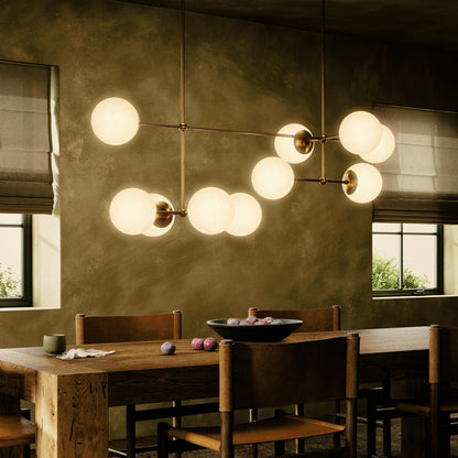 Armstrong Linear Chandelier by Four Hands. Made from brass, thermoplastic, glass in a modern style.