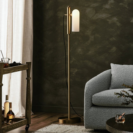Odyssey 1 Floor Lamp by Four Hands in burnished brass, opal matte glass and burnished brass. Made from brass, glass in a modern style.