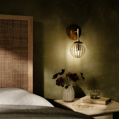 Sunset Sconce by Four Hands. Made from brass, thermoplastic, glass in a modern style.
