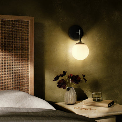 Sunset Sconce by Four Hands. Made from brass, thermoplastic, glass in a modern style.