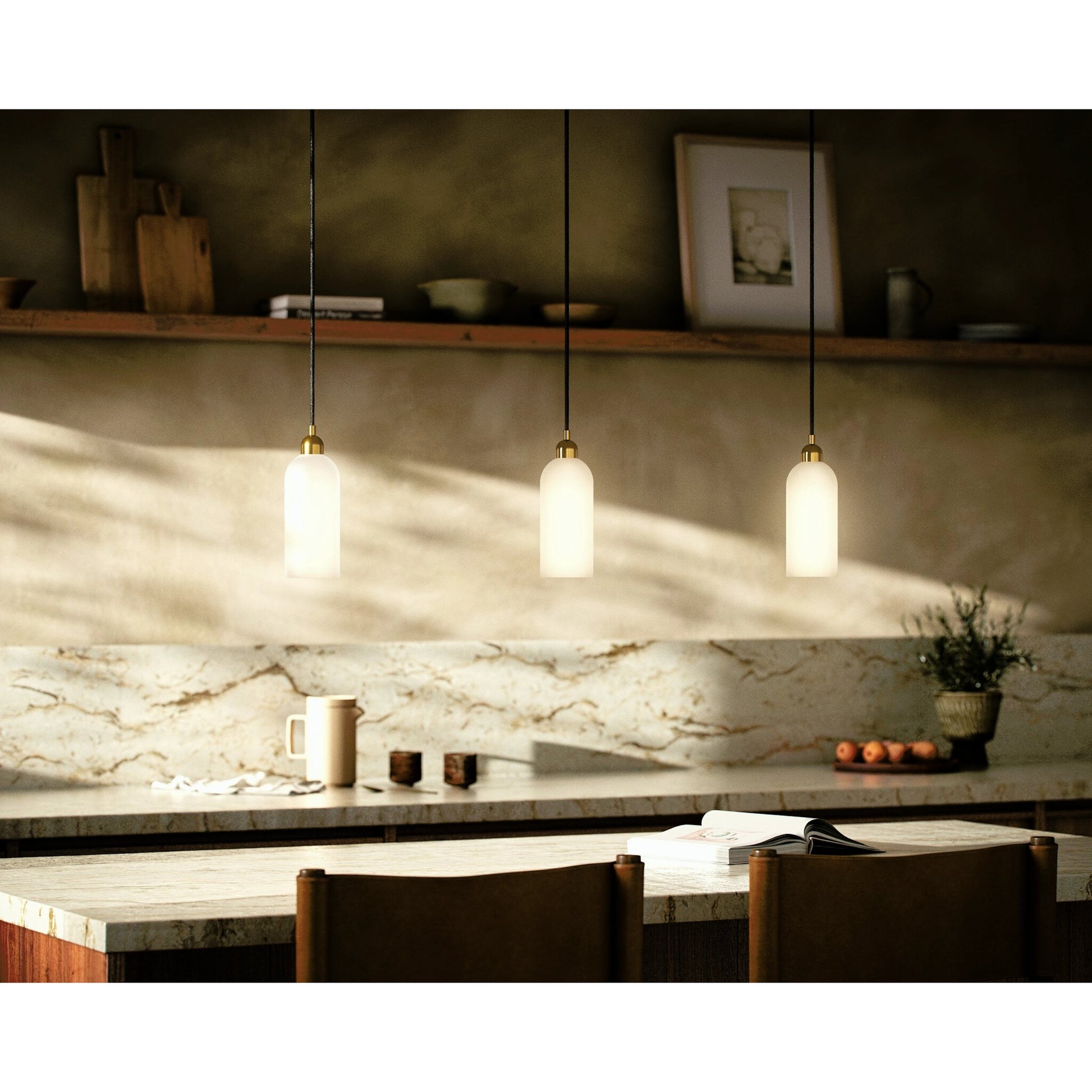 Odyssey Single Pendant by Four Hands in opal matte glass, black cord, burnished brass and opal matte glass. Made from glass, thermoplastic, brass in a modern style.