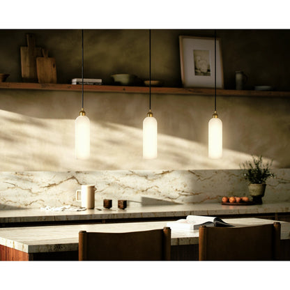 Odyssey Single Pendant by Four Hands in opal matte glass, black cord, burnished brass and opal matte glass. Made from glass, thermoplastic, brass in a modern style.