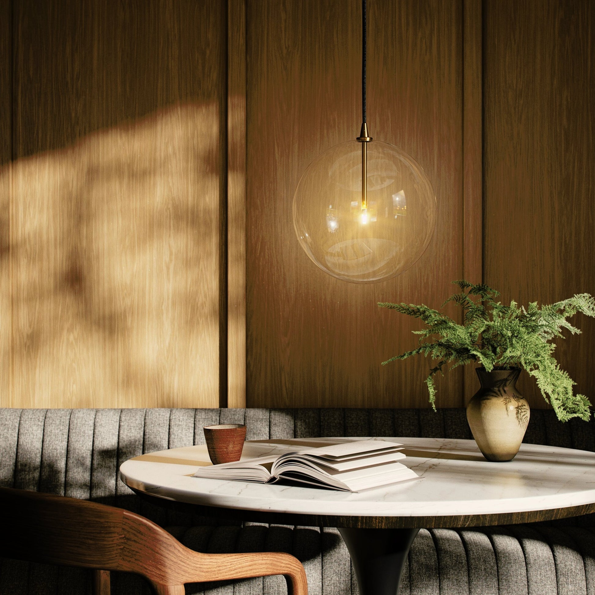 Glass Globe Pendant by Four Hands. Made from glass, thermoplastic, brass in a modern style.