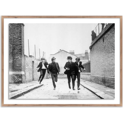 The Beatles Running in a Hard Day's Night by Getty Images by Four Hands. Made from acrylic glazing in a modern style.
