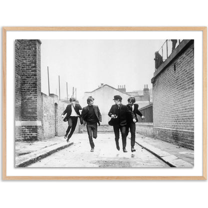 The Beatles Running in a Hard Day's Night by Getty Images by Four Hands. Made from acrylic glazing in a modern style.