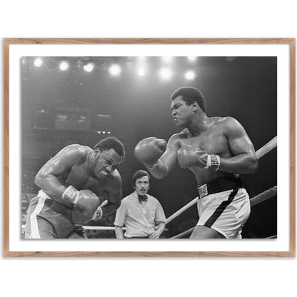 Muhammad Ali Punching Joe Frazier by Getty Images by Four Hands. Made from unique in a modern style.