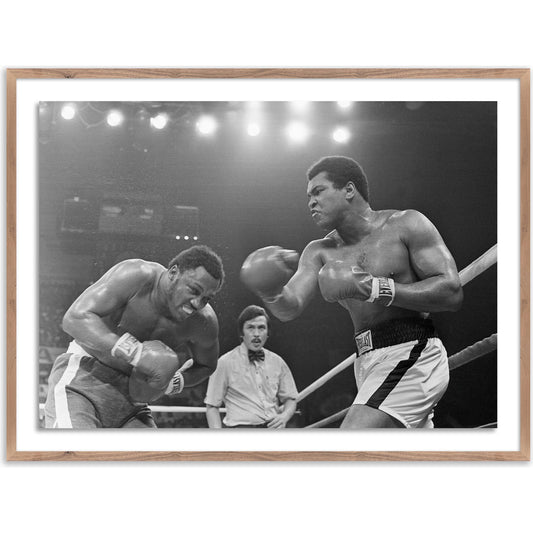 Muhammad Ali Punching Joe Frazier by Getty Images by Four Hands. Made from unique in a modern style.