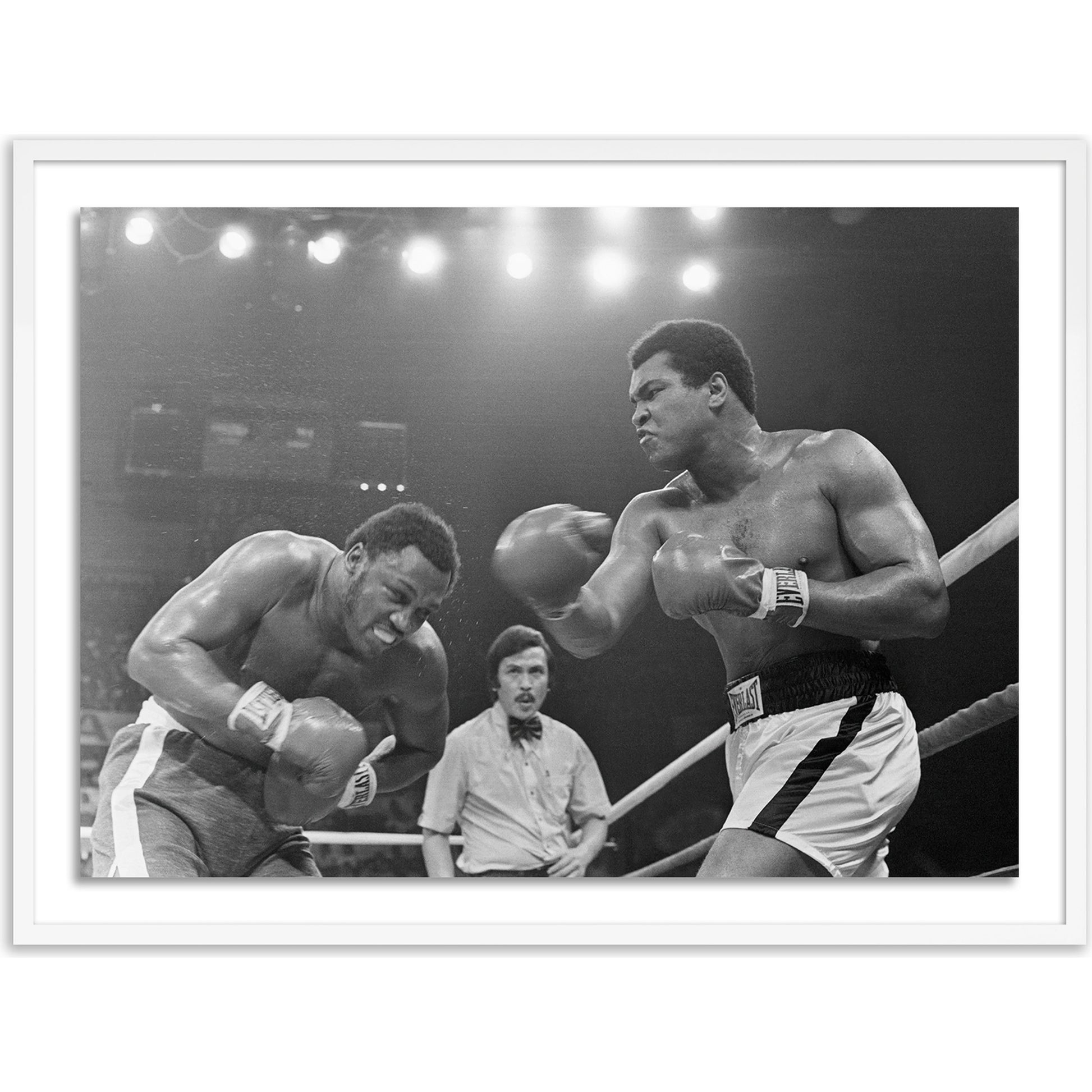 Muhammad Ali Punching Joe Frazier by Getty Images by Four Hands. Made from unique in a modern style.