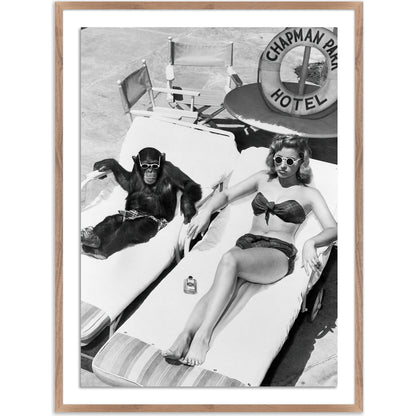 Woman Sunbathing with Chimpanzee by Getty Images by Four Hands. Made from acrylic glazing in a modern style.