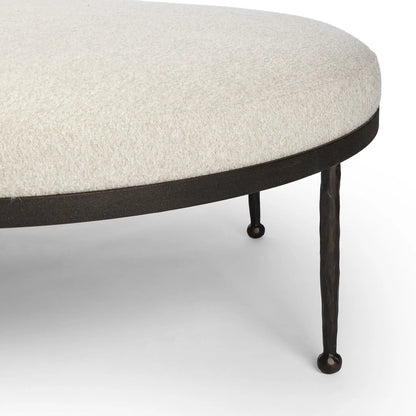 Corinne Cocktail Ottoman by Four Hands in crete pebble, hammered bronze, textured bronze. Made from 100% post consumer recycled polypropylene, iron in a unique style.