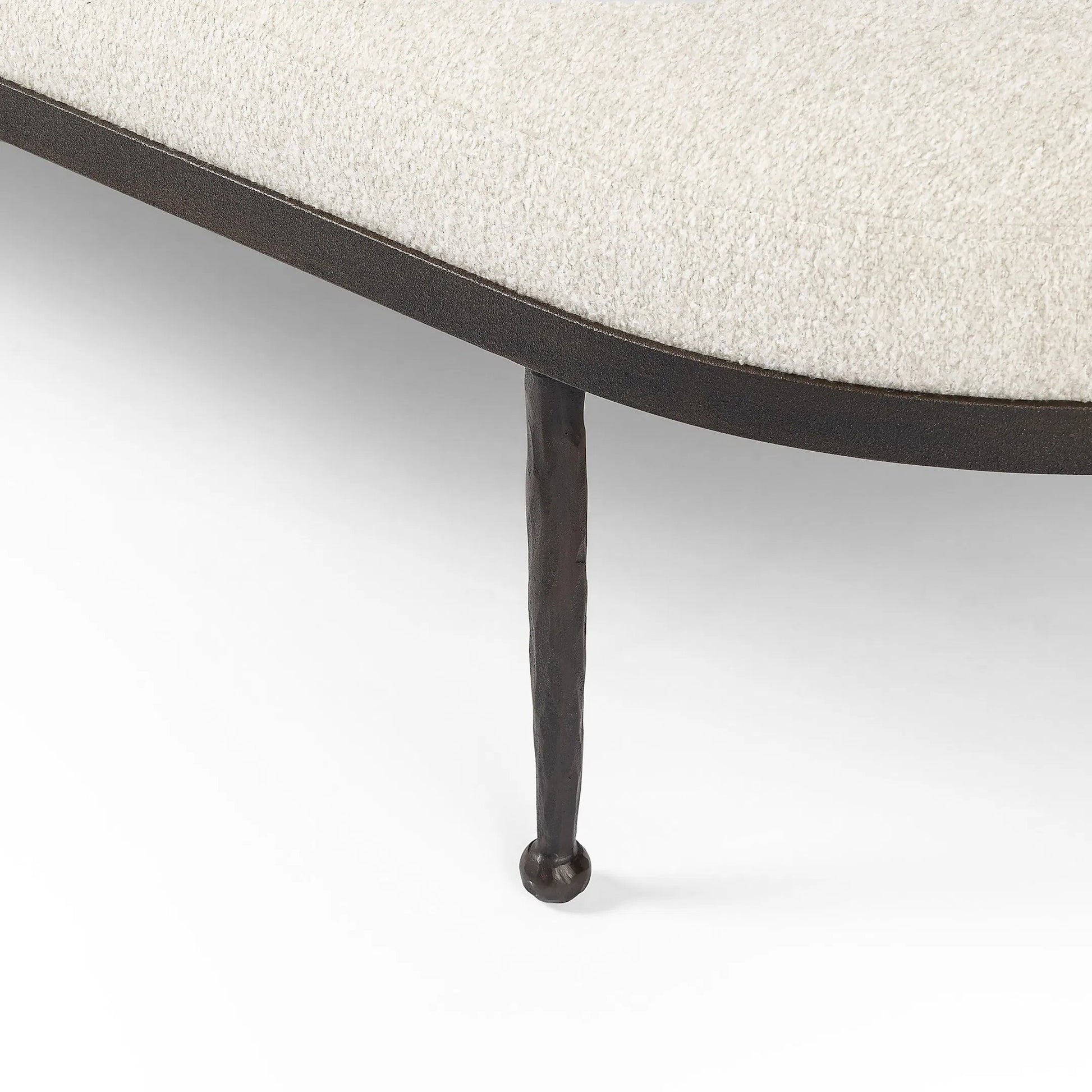 Corinne Cocktail Ottoman by Four Hands in crete pebble, hammered bronze, textured bronze. Made from 100% post consumer recycled polypropylene, iron in a unique style.