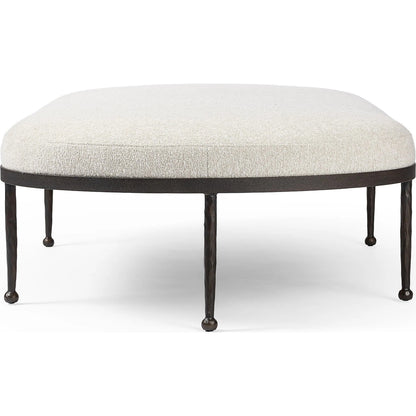 Corinne Cocktail Ottoman by Four Hands in crete pebble, hammered bronze, textured bronze. Made from 100% post consumer recycled polypropylene, iron in a unique style.