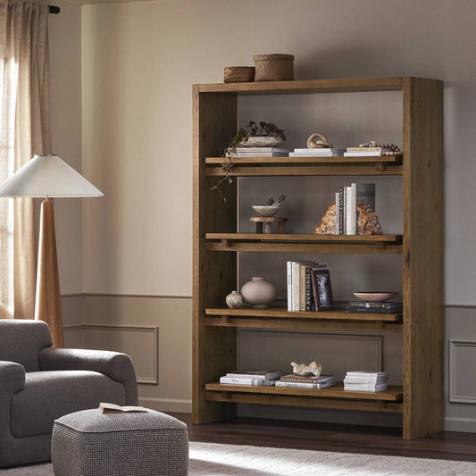 Theodore Bookcase by Four Hands in rustic amber oak veneer. Made from thick oak veneer, engineered hardwood in a transitional style.
