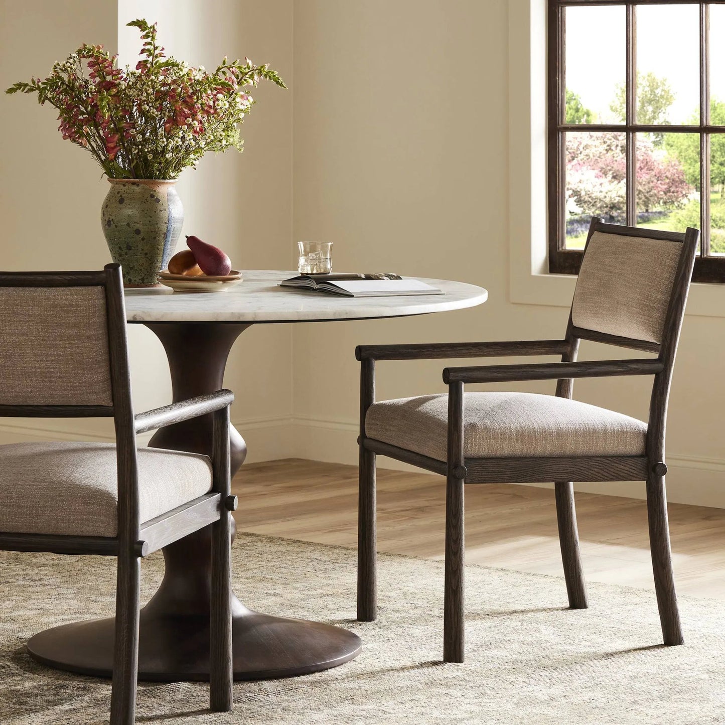 011 SI-2635254 | Lifestyle | Akiro Dining Armchair by Four Hands in laken stone, warm oak. Made from 90% polyester, 10% viscose (rayon), solid oak in a unique style.