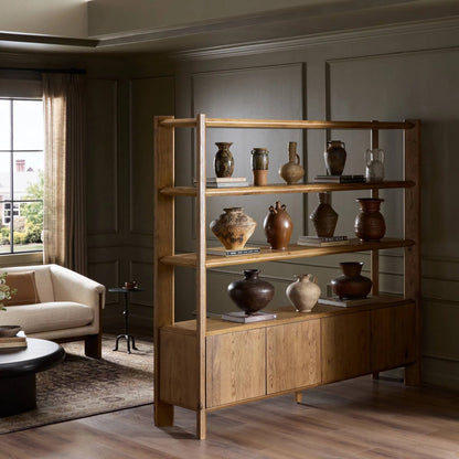 Orwin Wide Bookshelf by Four Hands in worn oak, worn oak veneer. Made from solid oak, oak veneer in a transitional style.