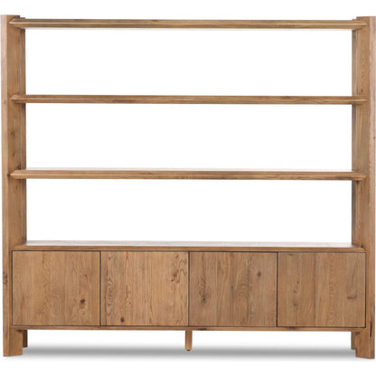 Orwin Wide Bookshelf by Four Hands in worn oak, worn oak veneer. Made from solid oak, oak veneer in a transitional style.