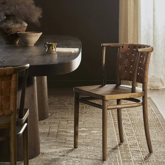 Penelope Dining Chair by Four Hands in haven tobacco, toasted nettlewood. Made from top grain leather, solid nettlewood in a traditional style.
