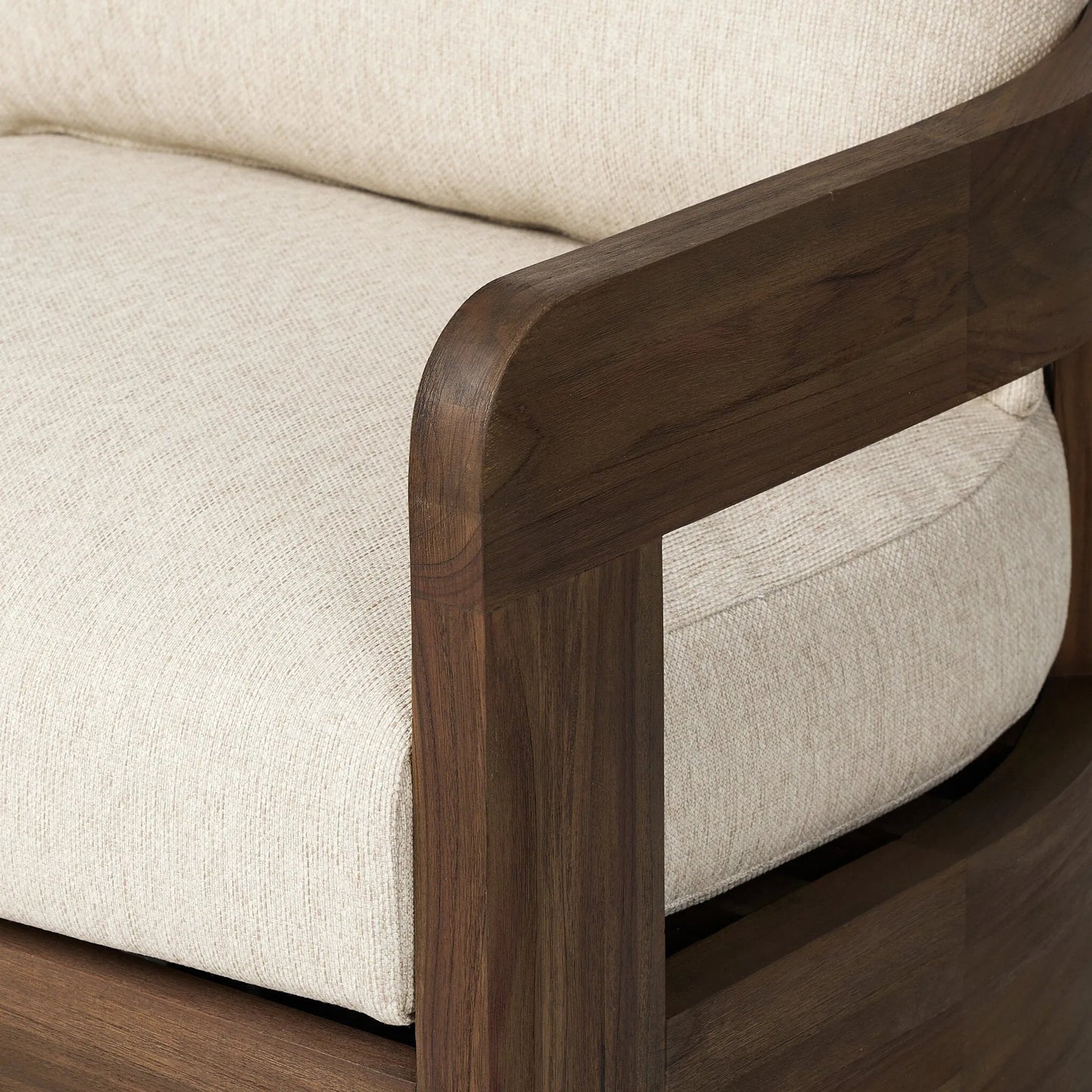 017 SI-2377052 | Closeup | Jackson Outdoor Swivel Chair by Four Hands. Made from 100% olefin, solid fsc®-certified teak in a modern style.