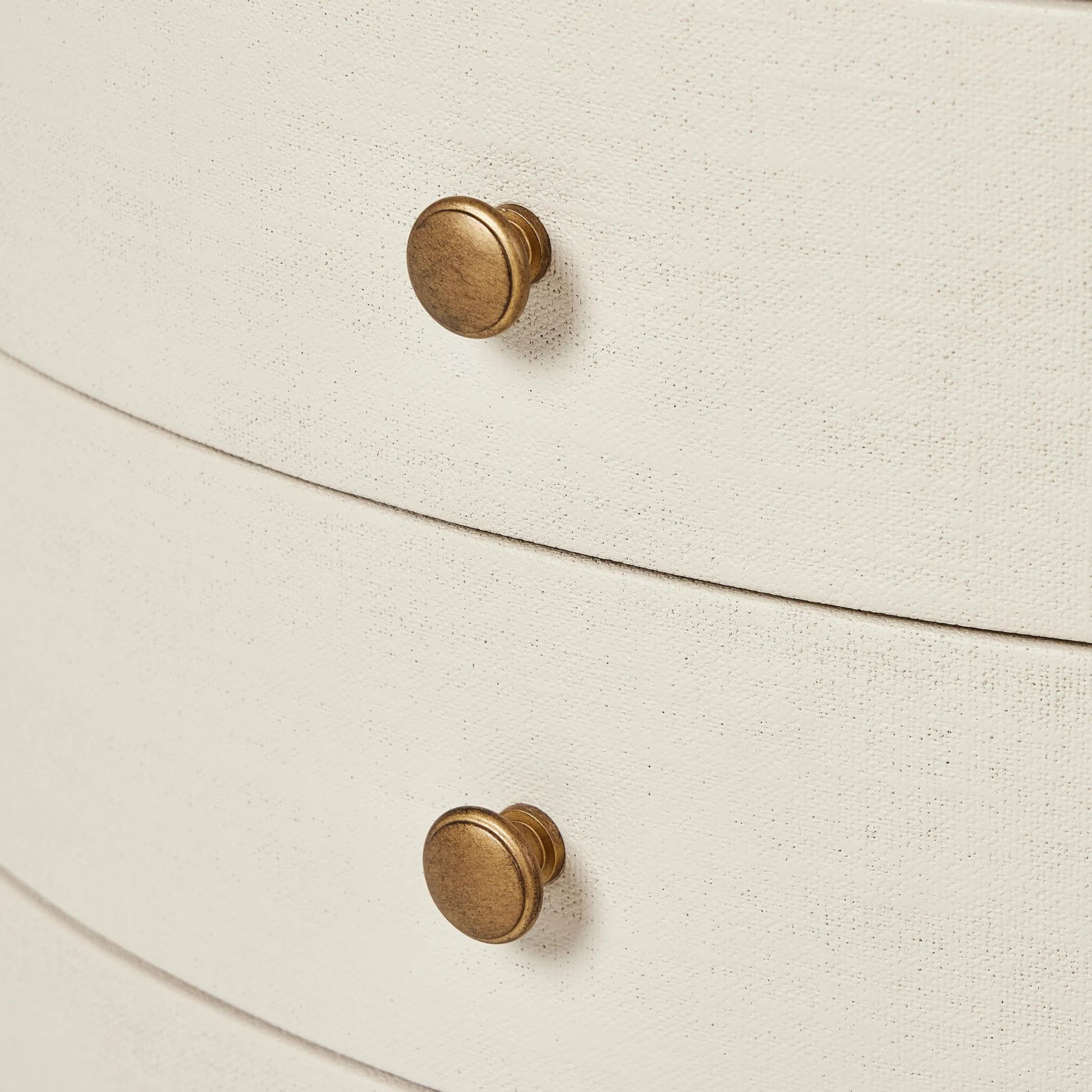 Amelia Oval Nightstand by Four Hands in ivory painted linen. Made from painted linen in a transitional style.