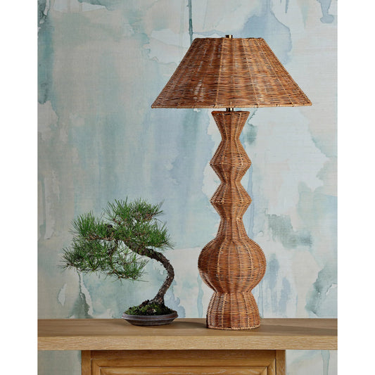 Nirvana Table Lamp by Currey and Company in natural. Made from rattan in a rustic style.