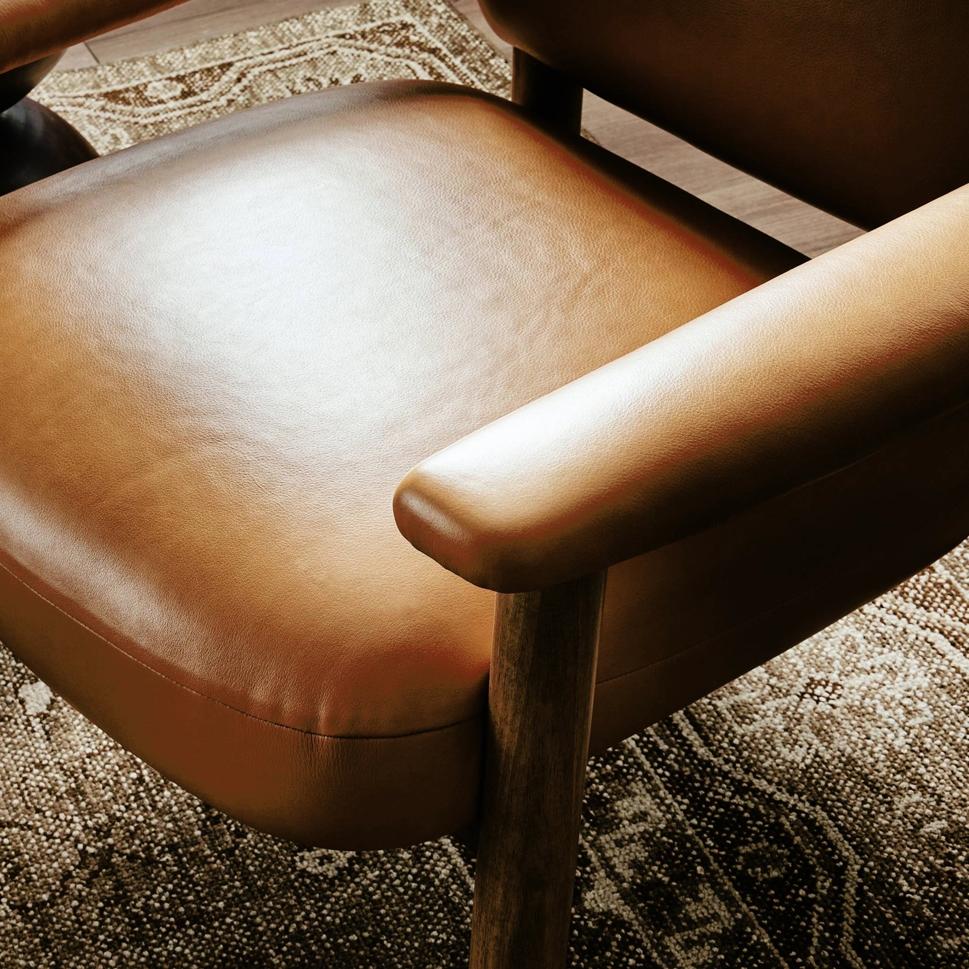 Eisley Chair by Four Hands. Made from top grain leather, solid parawood, poplar plywood in a modern style.