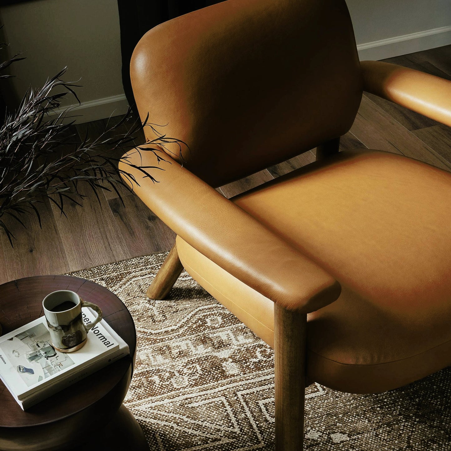 013 SI-2158149 | Lifestyle | Eisley Chair by Four Hands. Made from top grain leather, solid parawood, poplar plywood in a modern style.