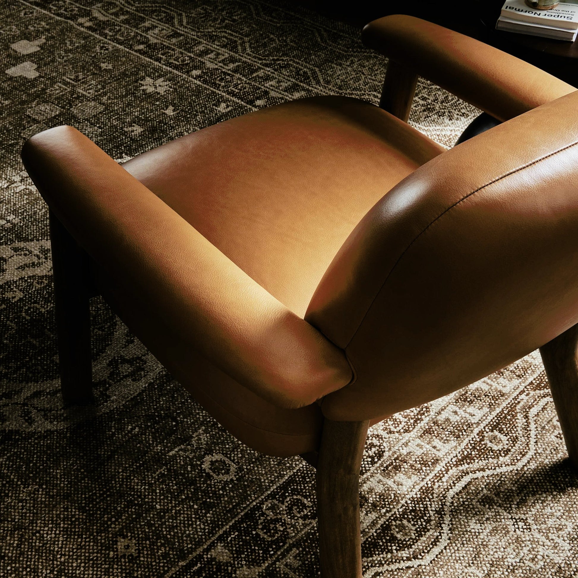 Eisley Chair by Four Hands. Made from top grain leather, solid parawood, poplar plywood in a modern style.