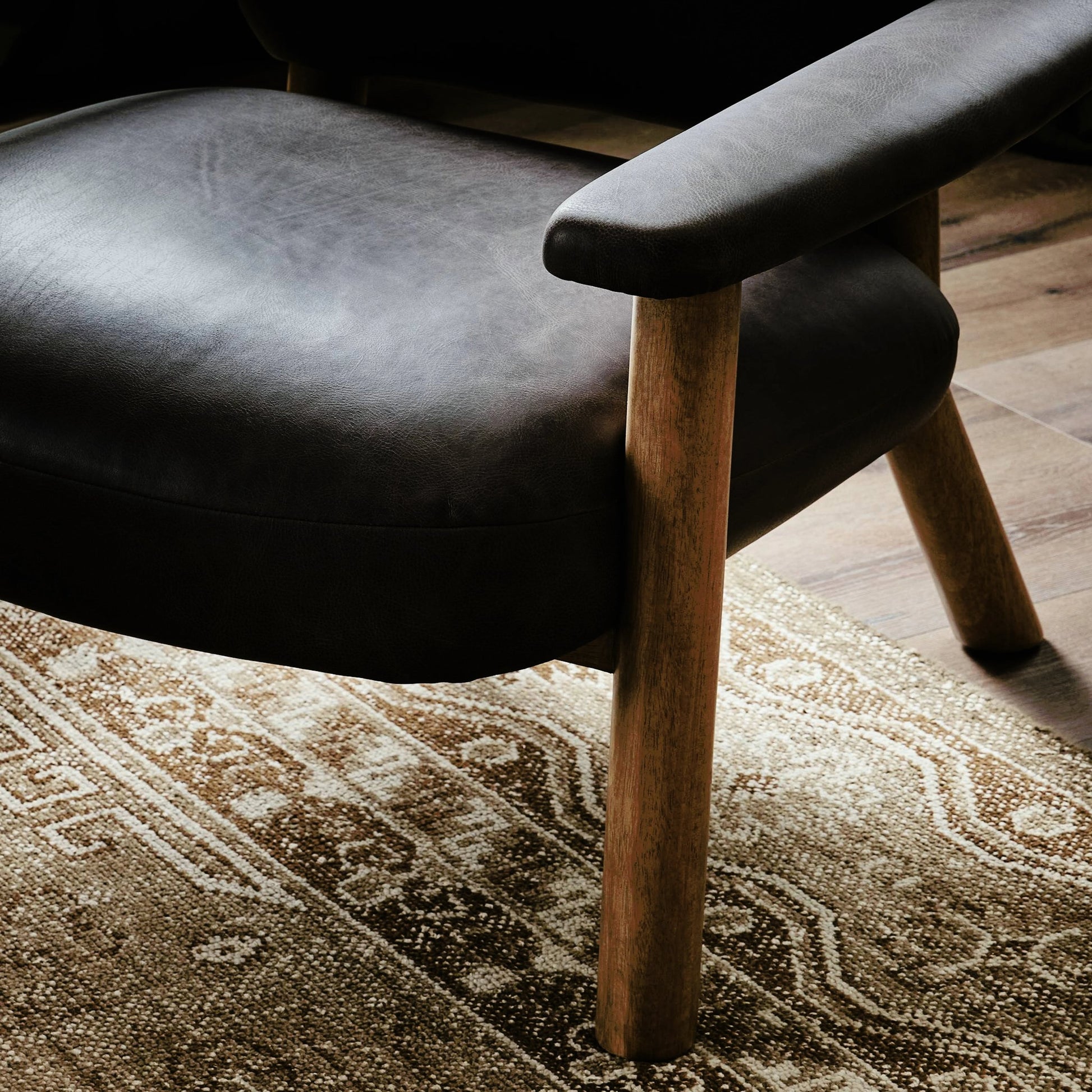 Eisley Chair by Four Hands. Made from top grain leather, solid parawood, poplar plywood in a modern style.
