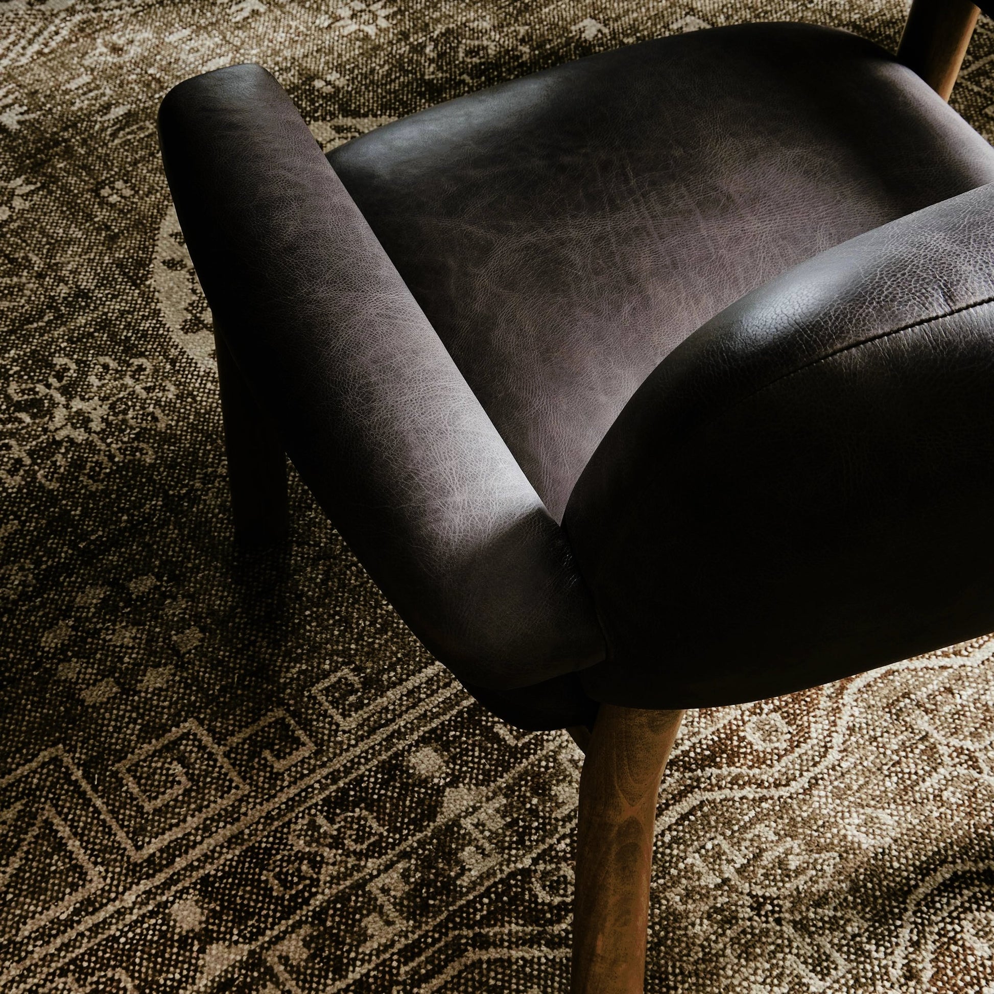 Eisley Chair by Four Hands. Made from top grain leather, solid parawood, poplar plywood in a modern style.