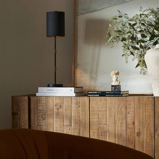 Maurice Table Lamp by Four Hands in antiqued iron, matte black plaster. Made from iron in a unique style.
