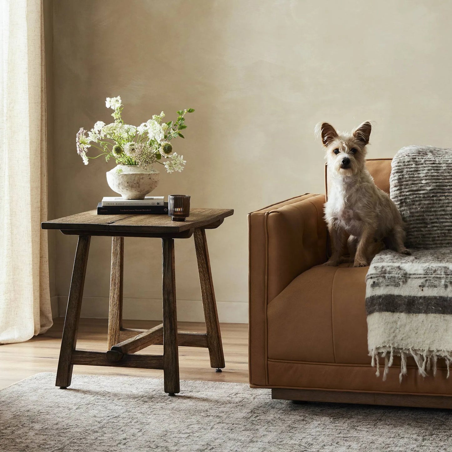 013 SI-2327556 | Lifestyle | Elio End Table by Four Hands in burnt bleached oak. Made from solid oak in a transitional style.
