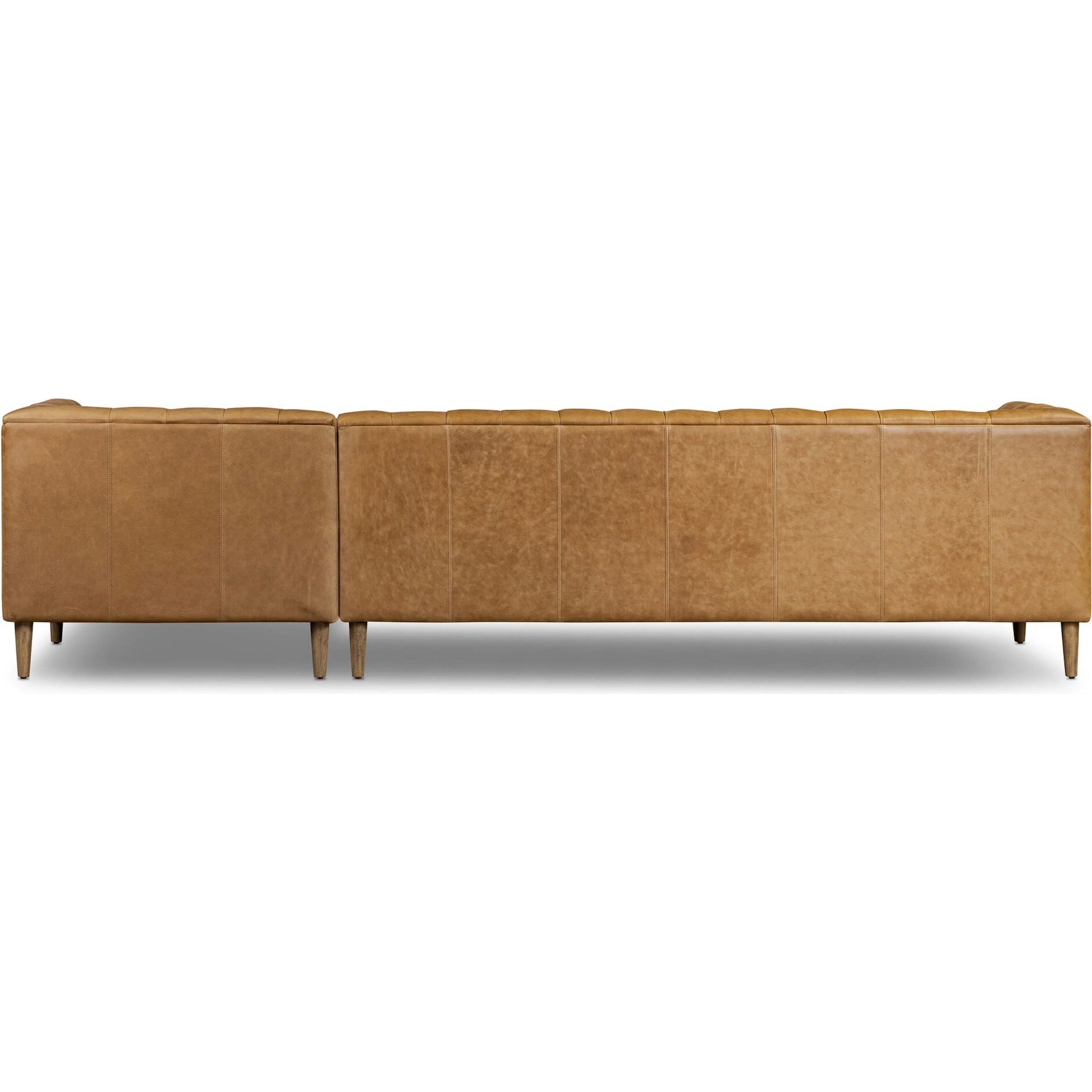 Thurston 2-Piece Sectional by Four Hands in cascara cognac, distressed parawood. Made from top grain leather, solid parawood in a unique style.