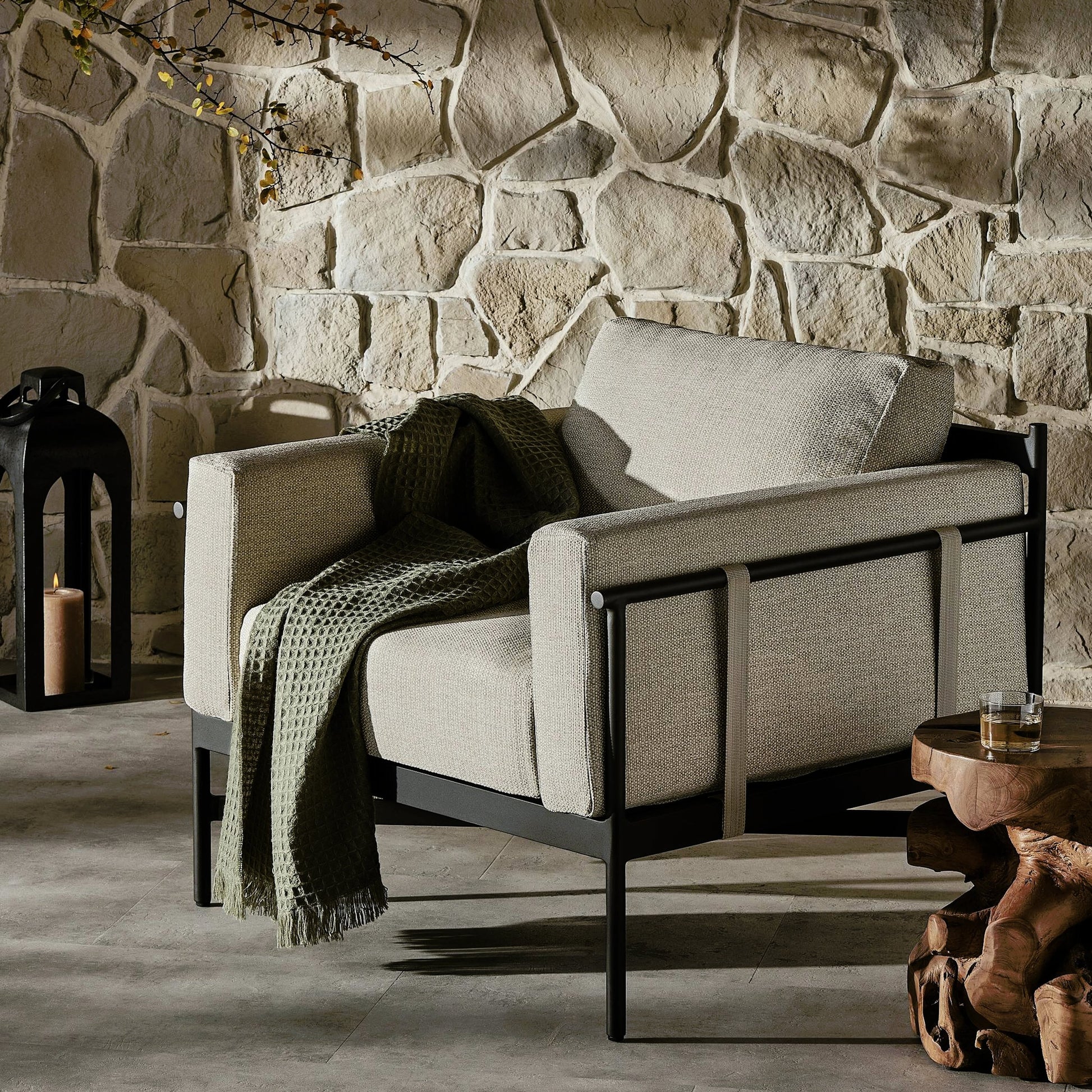 Hearst Outdoor Chair by Four Hands in bronze. Made from 100% olefin, aluminum, 100% polypropylene in a modern style.