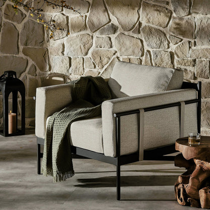 Hearst Outdoor Chair by Four Hands in bronze. Made from 100% olefin, aluminum, 100% polypropylene in a modern style.