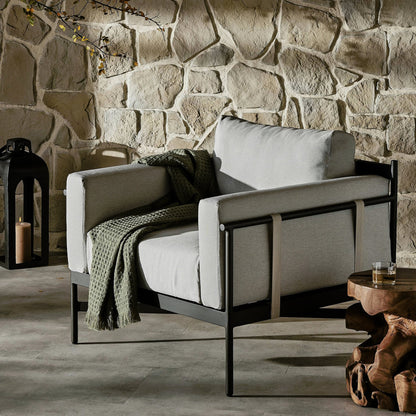 Hearst Outdoor Chair by Four Hands in bronze. Made from 100% olefin, aluminum, 100% polypropylene in a modern style.