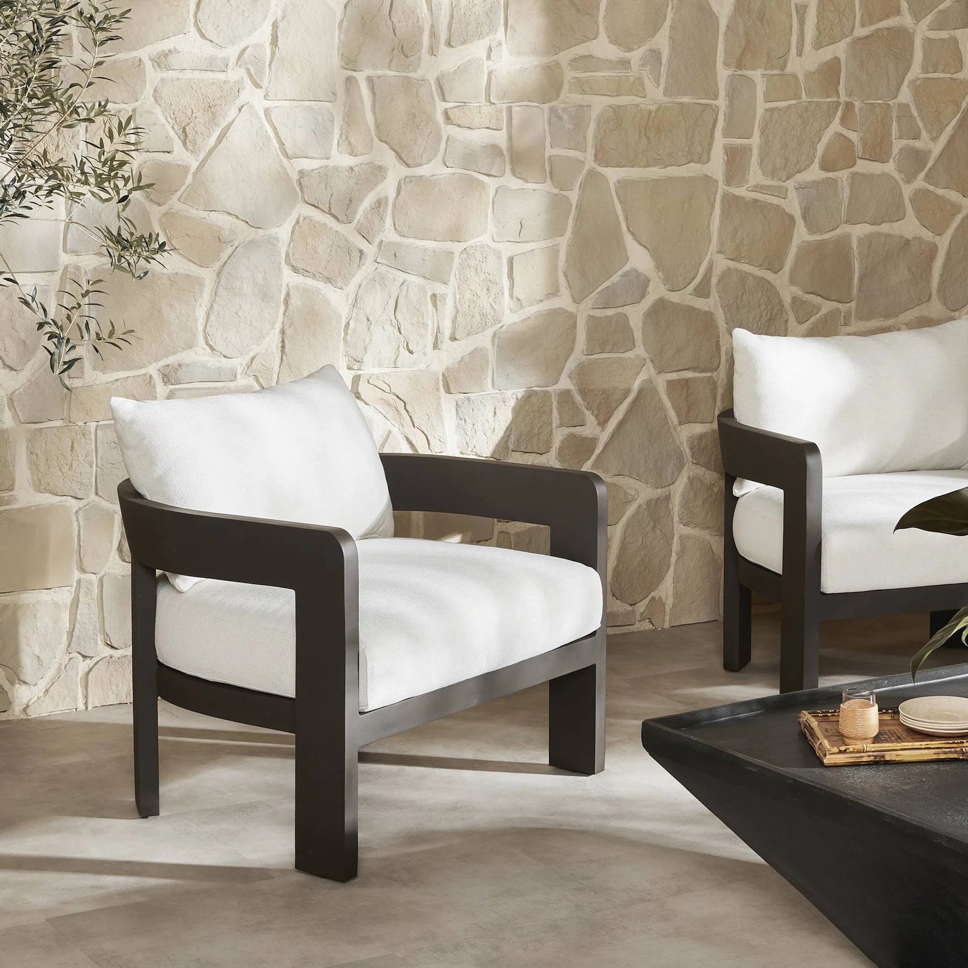 Jackson Outdoor Metal Chair by Four Hands in alessi linen, bronze. Made from 100% polypropylene, aluminum, 91% polyurethane foam pad, 9% polyester fiber batting in a modern style.
