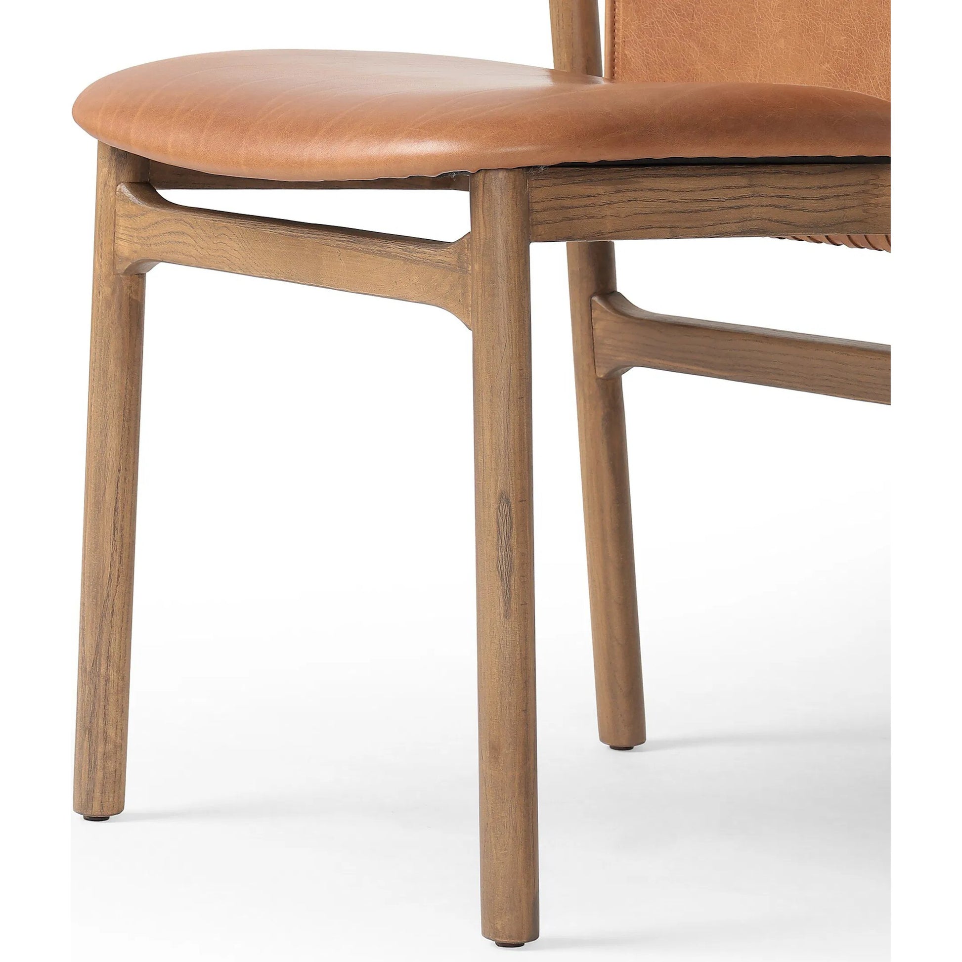 Baden Dining Chair by Four Hands. Made from unique in a transitional style.