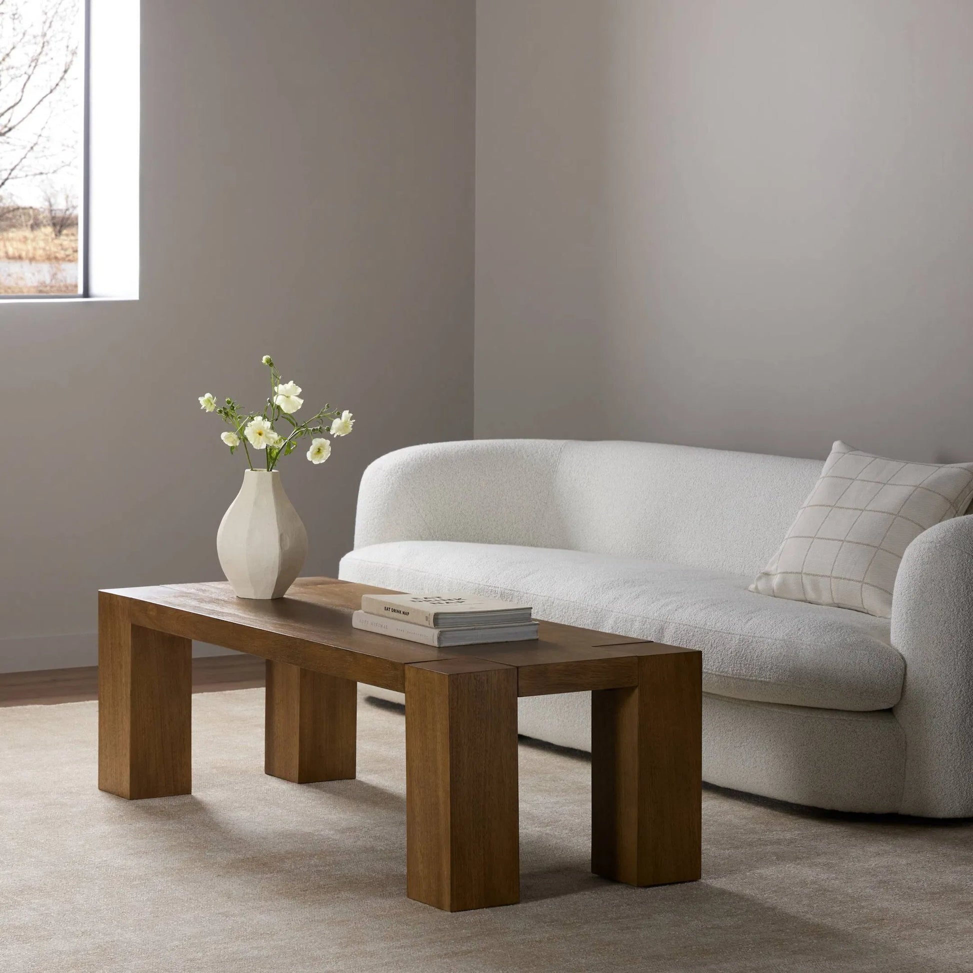 Emeli Rectangular Coffee Table by Four Hands in tawny rubberwood veneer. Made from parawood veneer in a unique style.