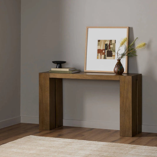 Emeli Console Table by Four Hands in tawny rubberwood veneer. Made from parawood veneer in a unique style.
