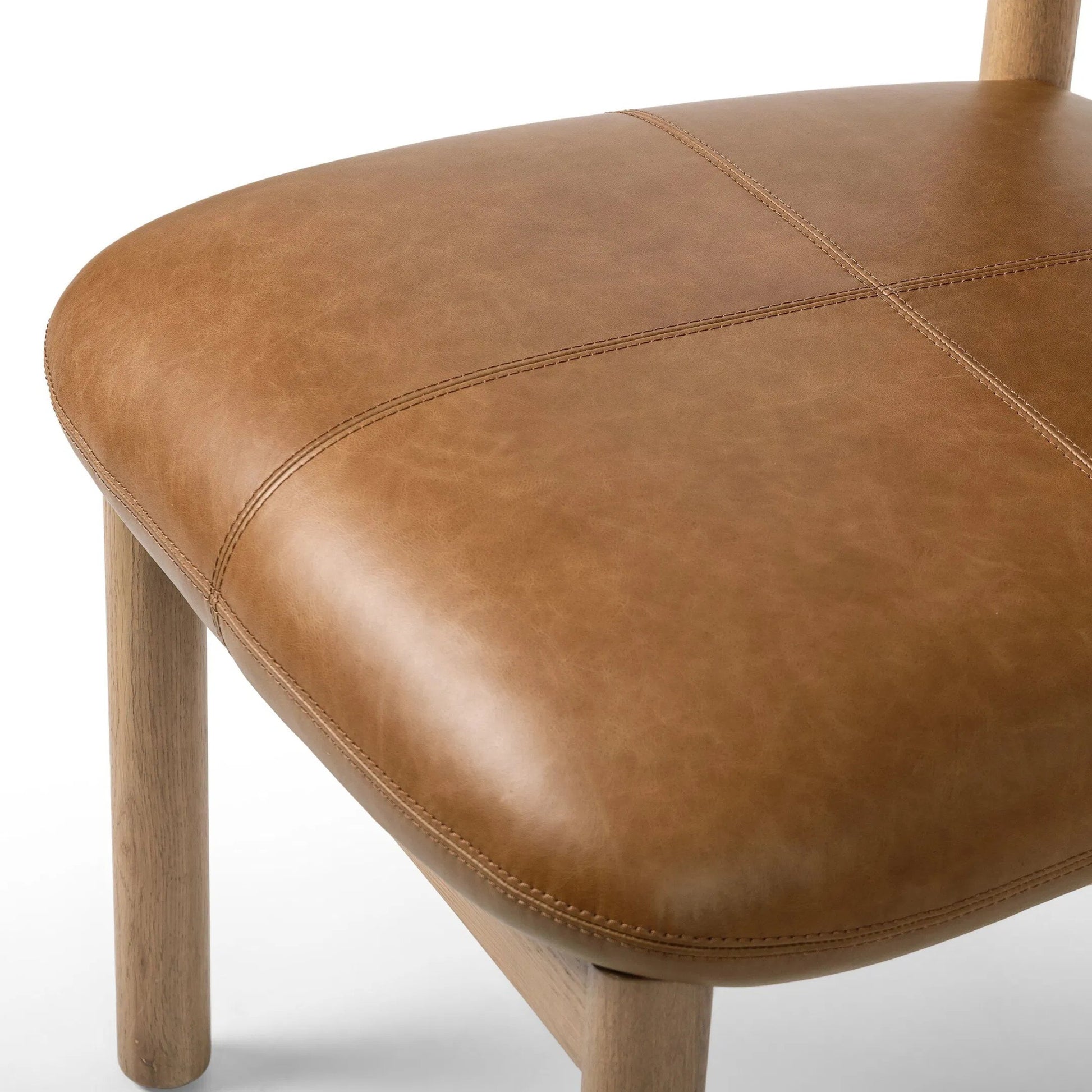 Adaline Dining Chair by Four Hands in sonoma chestnut, natural oak. Made from top grain leather, solid oak in a transitional style.