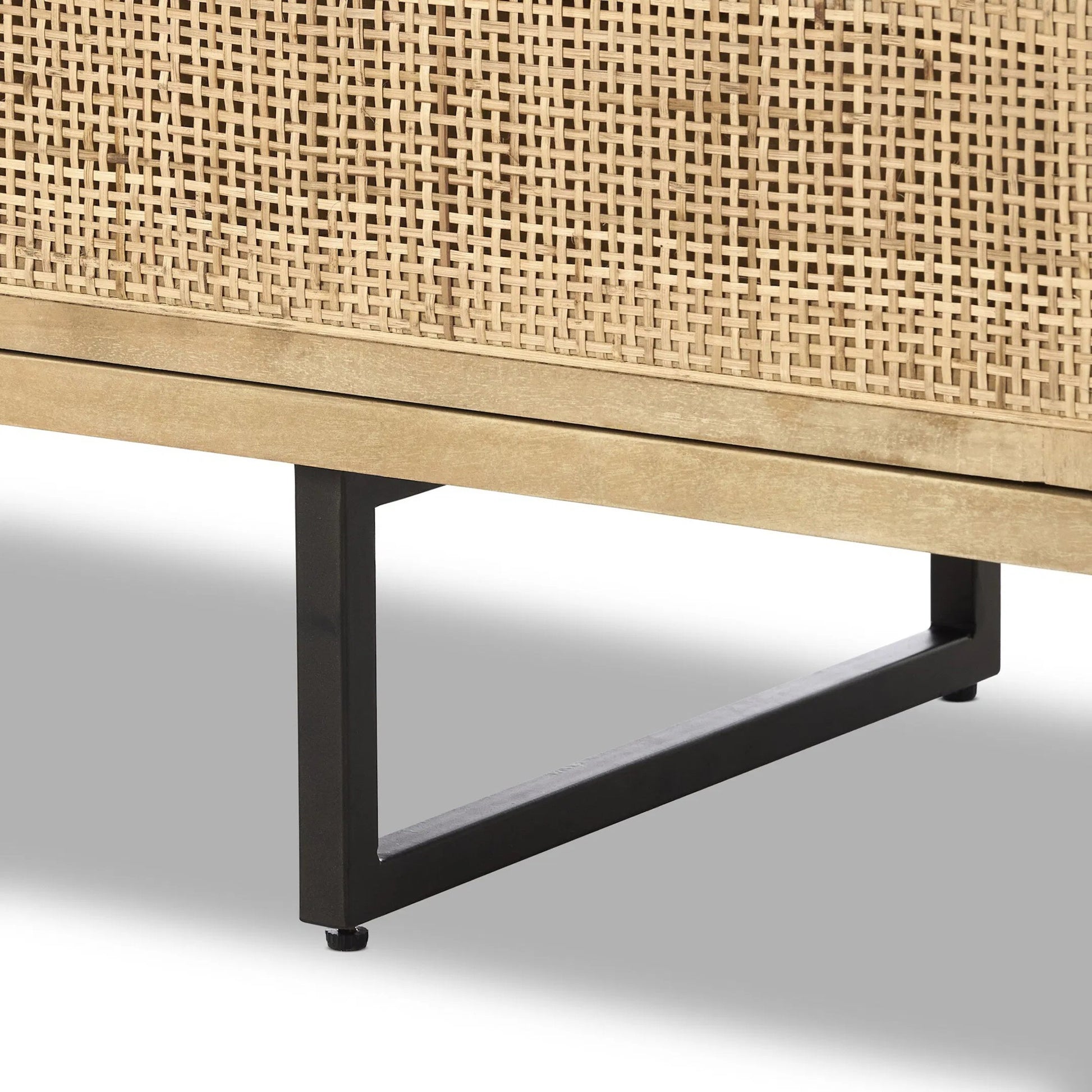 Carmel Sideboard 96" by Four Hands in natural cane, natural mango, charcoal grey. Made from cane, solid mango, iron in a transitional style.