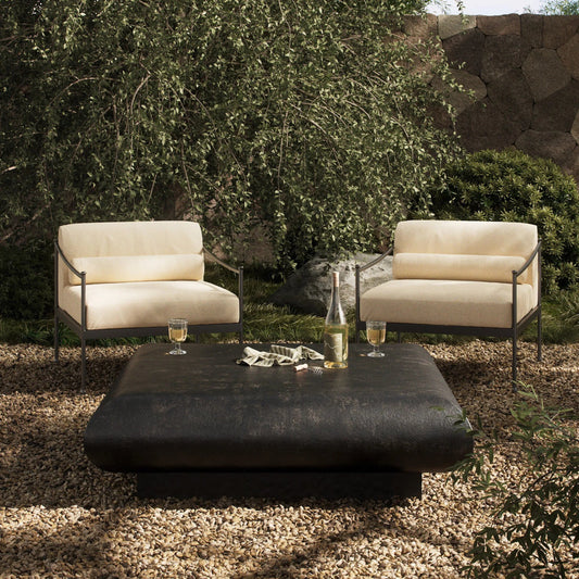 Ambra Outdoor Coffee Table by Four Hands in distressed bronze. Made from aluminum in a transitional style.