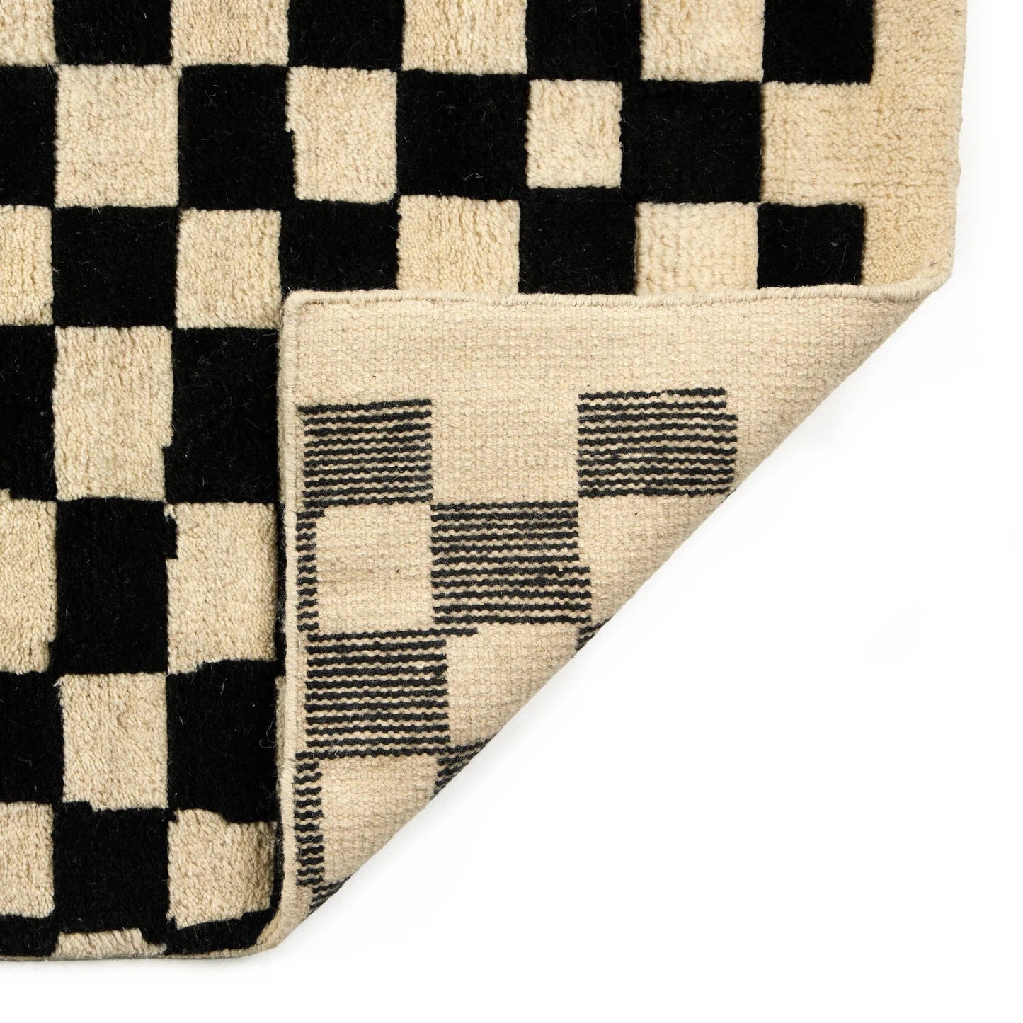 001 SI-2635353,SI-2635354,SI-2635355 | Closeup | Sinead Hand-Knotted Rug by Four Hands in sinead black. Made from 100% wool in a unique style.