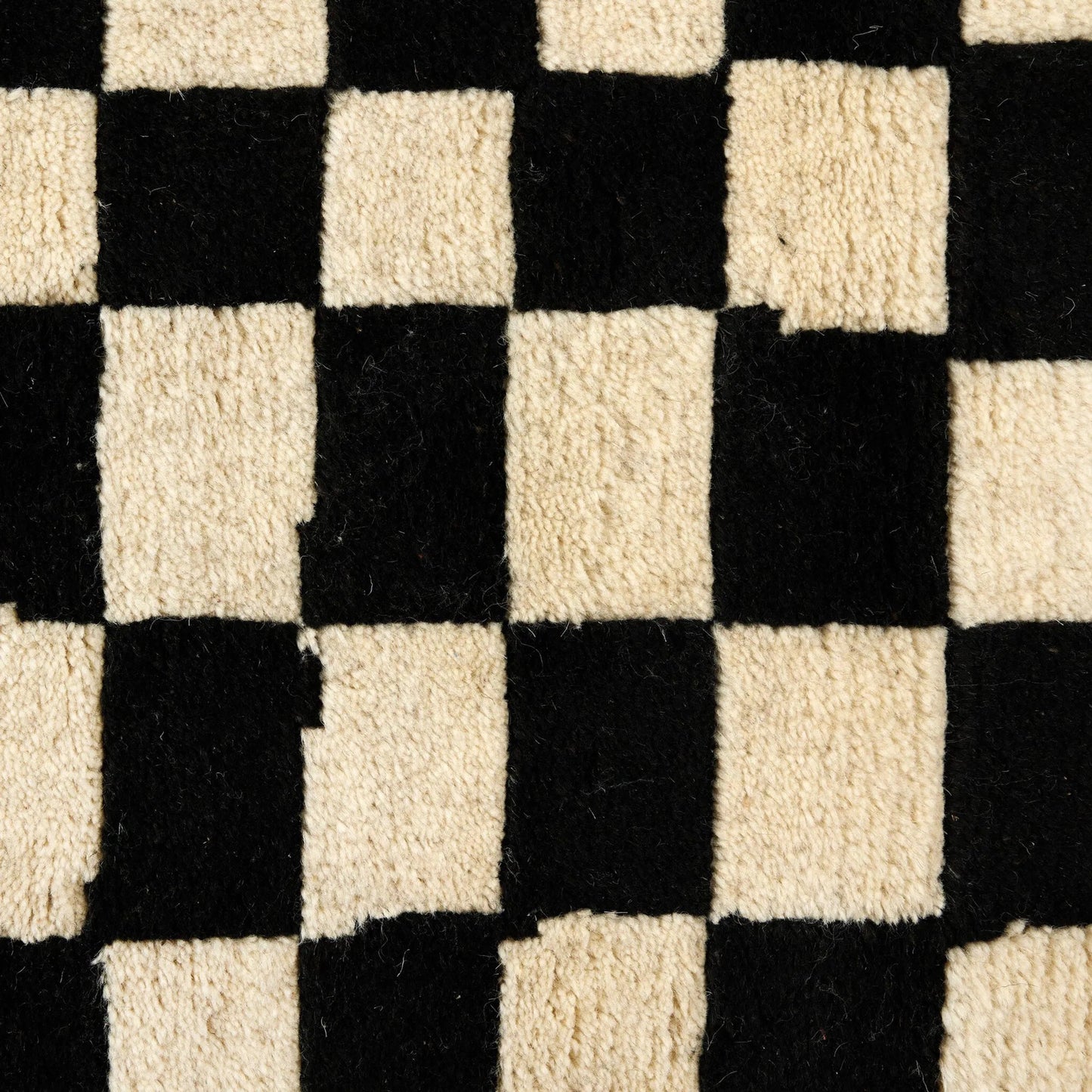 002 SI-2635353,SI-2635354,SI-2635355 | Closeup | Sinead Hand-Knotted Rug by Four Hands in sinead black. Made from 100% wool in a unique style.