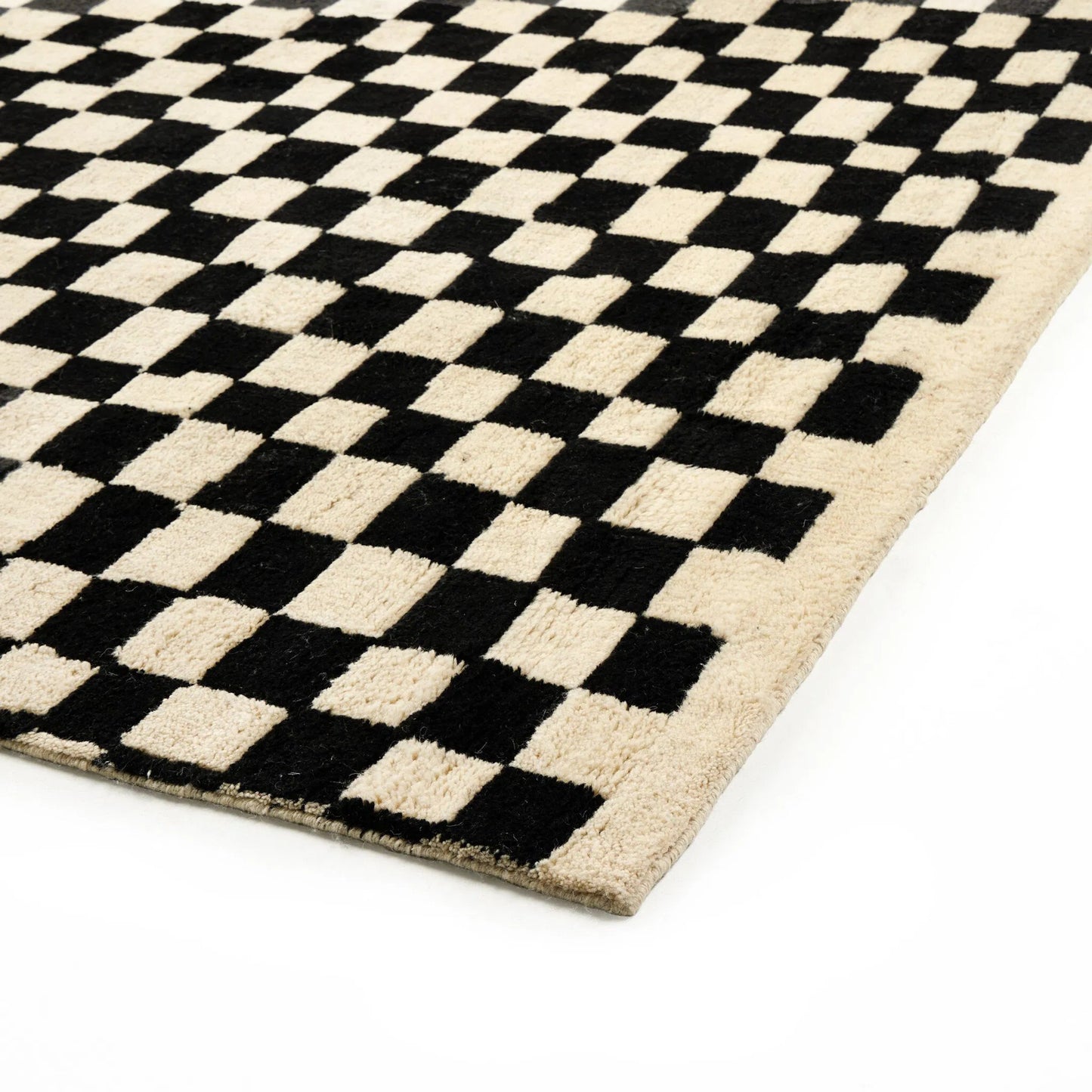 003 SI-2635353,SI-2635354,SI-2635355 | Closeup | Sinead Hand-Knotted Rug by Four Hands in sinead black. Made from 100% wool in a unique style.