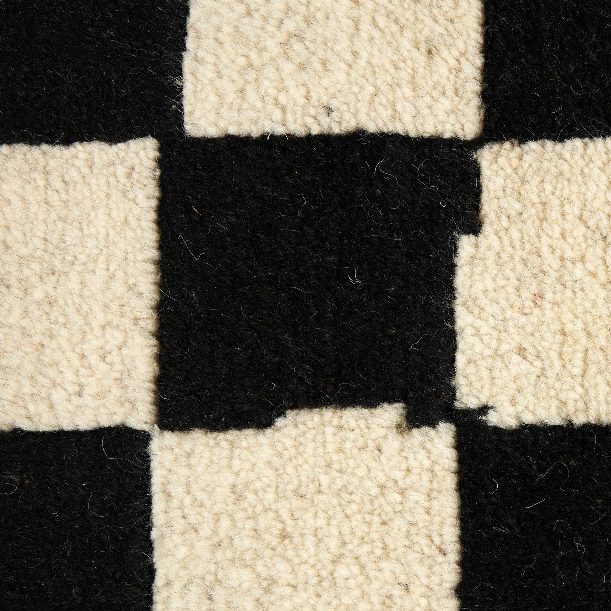 Sinead Hand-Knotted Rug by Four Hands in sinead black. Made from 100% wool in a unique style.