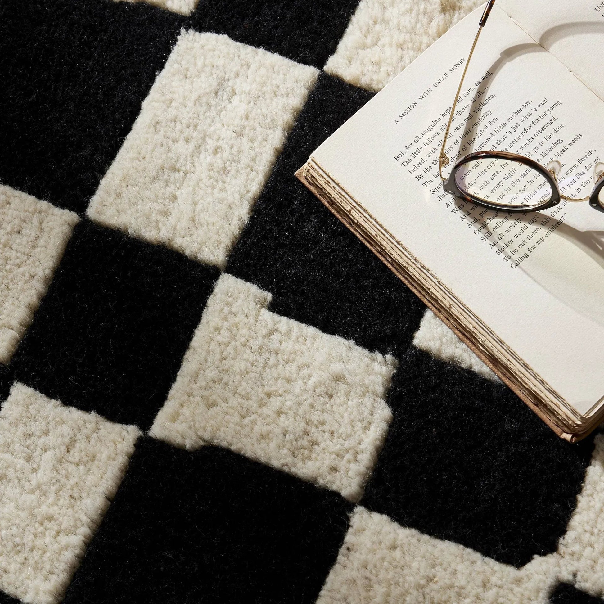 Sinead Hand-Knotted Rug by Four Hands in sinead black. Made from 100% wool in a unique style.